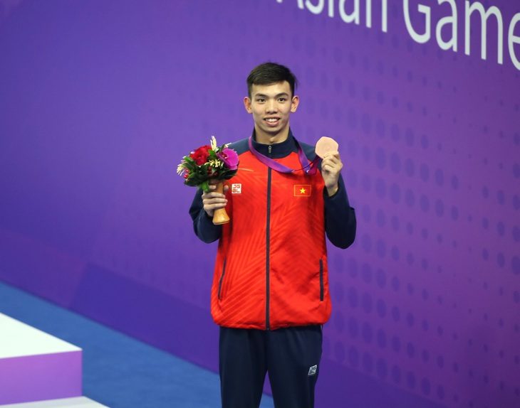Asiad 19 ngày 29-9: Nguyễn Huy Hoàng đoạt HCĐ 400m tự do - Ảnh 1. Kình ngư Nguyễn Huy Hoàng đoạt HCĐ 400m tự do - Ảnh: QUÝ LƯỢNG